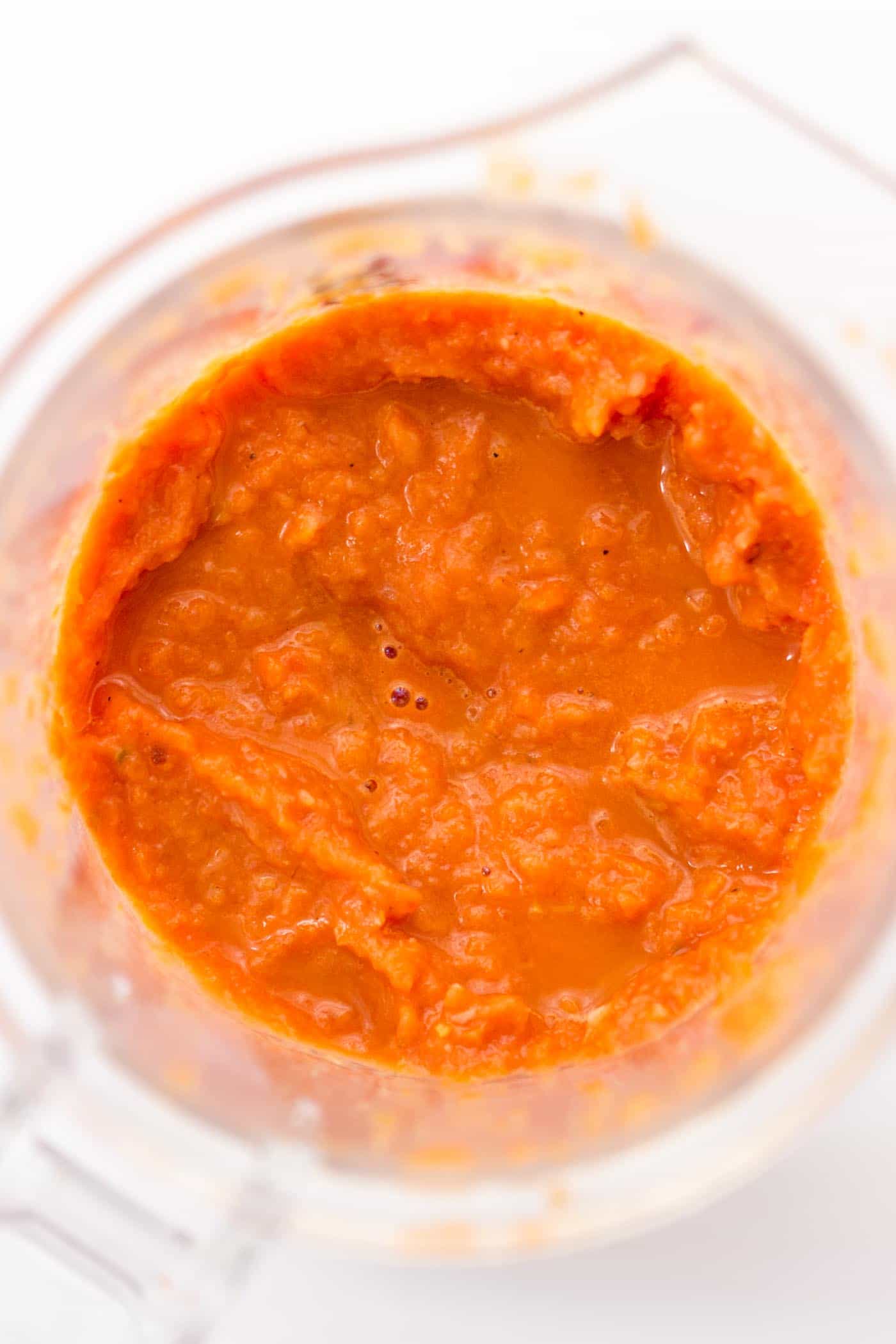 Pureed vegan bolognese sauce inside a blender.