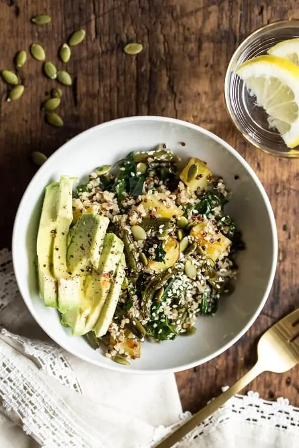 warm roasted winter quinoa salad with kale and avocado