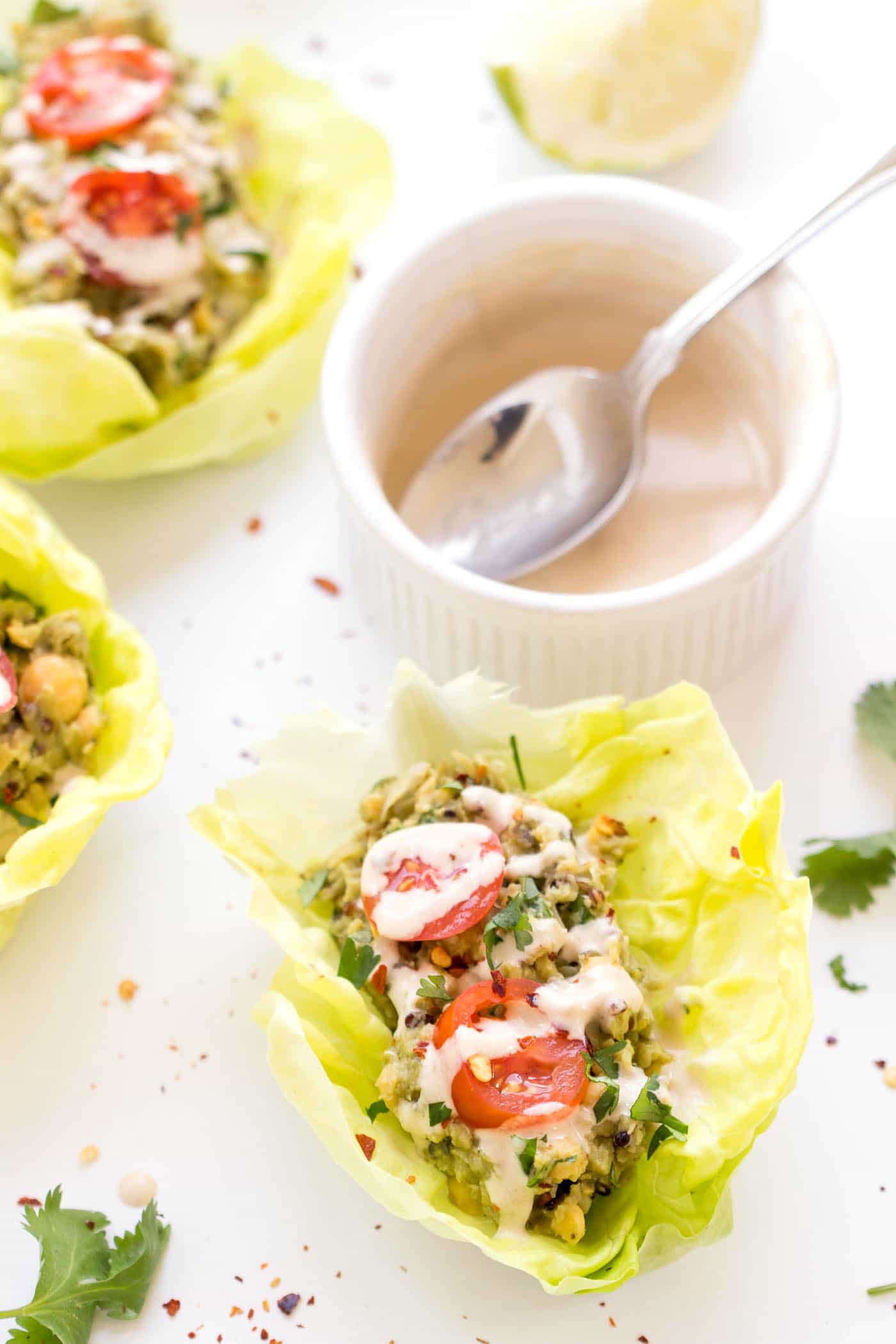 My new FAVE lunch is these quinoa lettuce wraps with a smashed chickpea and avocado filling! Kind of like a cross between hummus and guacamole only WAY BETTER!