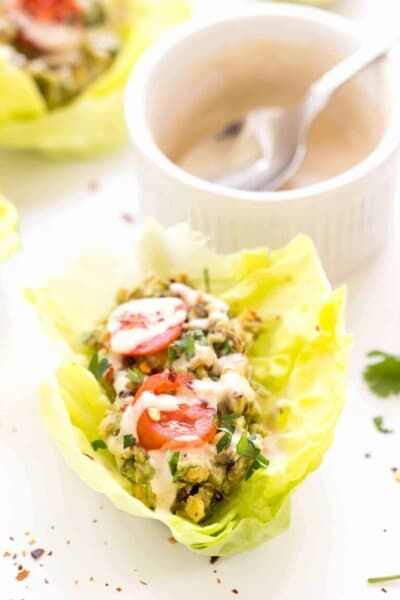 These make for a PERFECT lunch! Smashed Chickpea + Quinoa Lettuce Wraps that use avocado to replace the mayo!