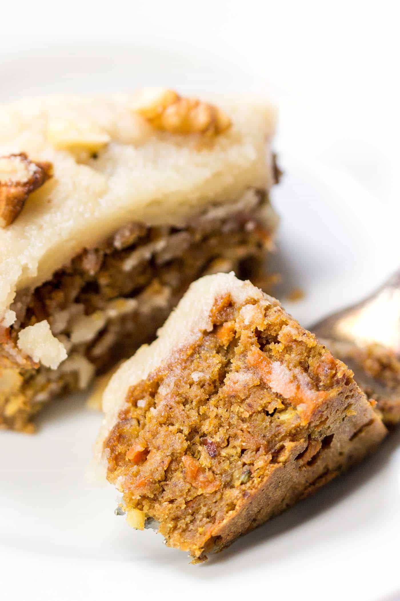This vegan carrot cake has the most amazing texture! And you'll never guess what's inside...clean, healthy and simple! [gluten-free]