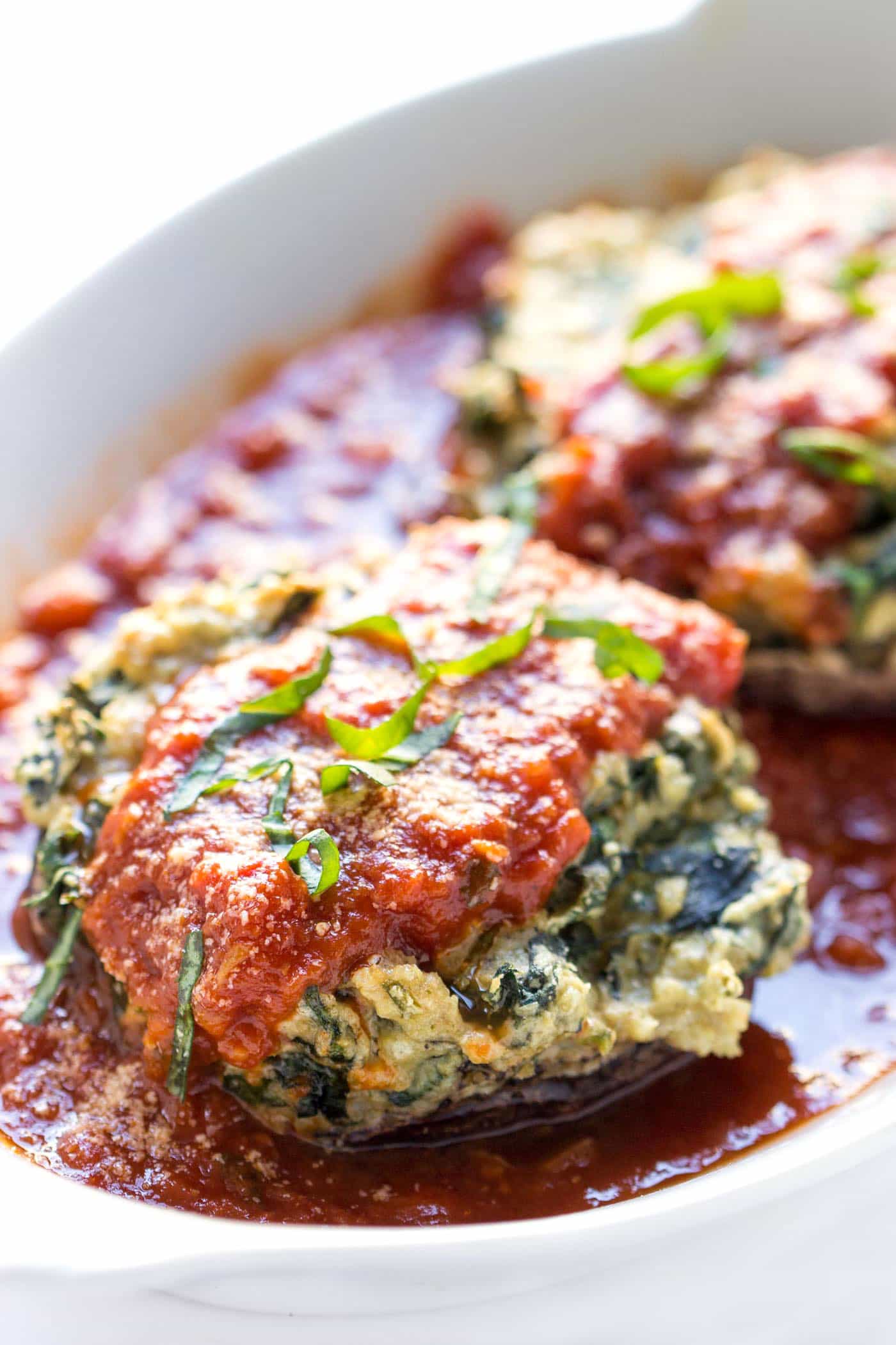 These VEGAN stuffed mushrooms are a healthier version of stuffed shells without the dairy OR gluten!