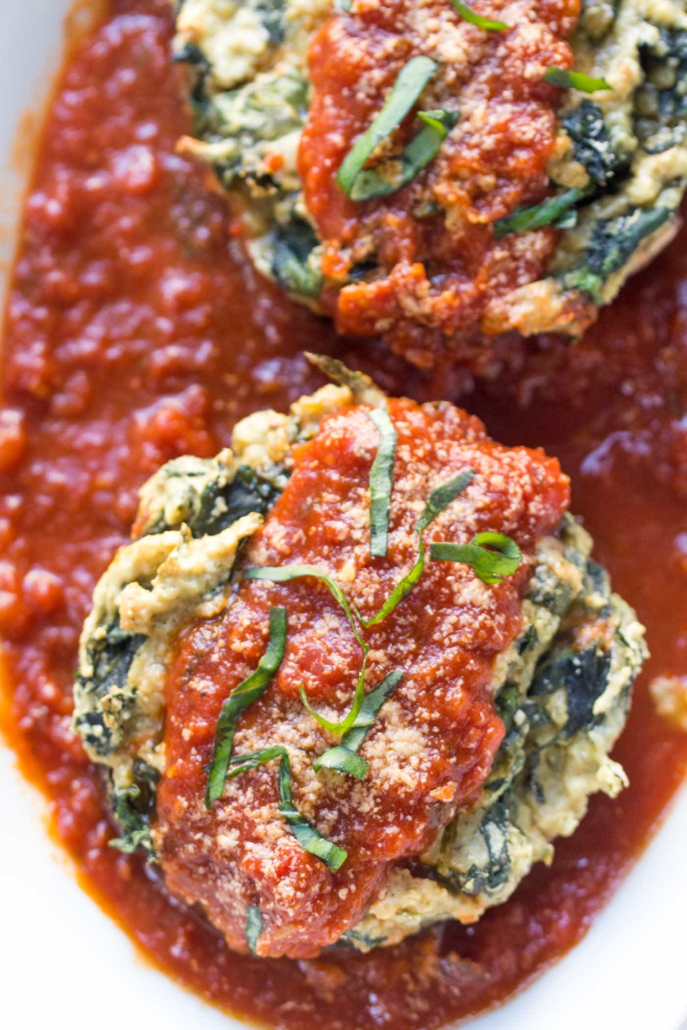 The most AMAZING vegan quinoa stuffed mushrooms with cashew ricotta and spinach -- a perfect weeknight meal for those who love Italian food but want something simple and healthy