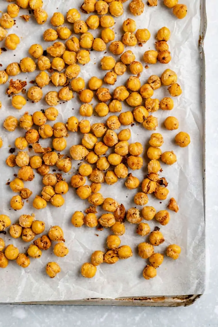 crispy chickpeas on a baking sheet lined with parchment paper