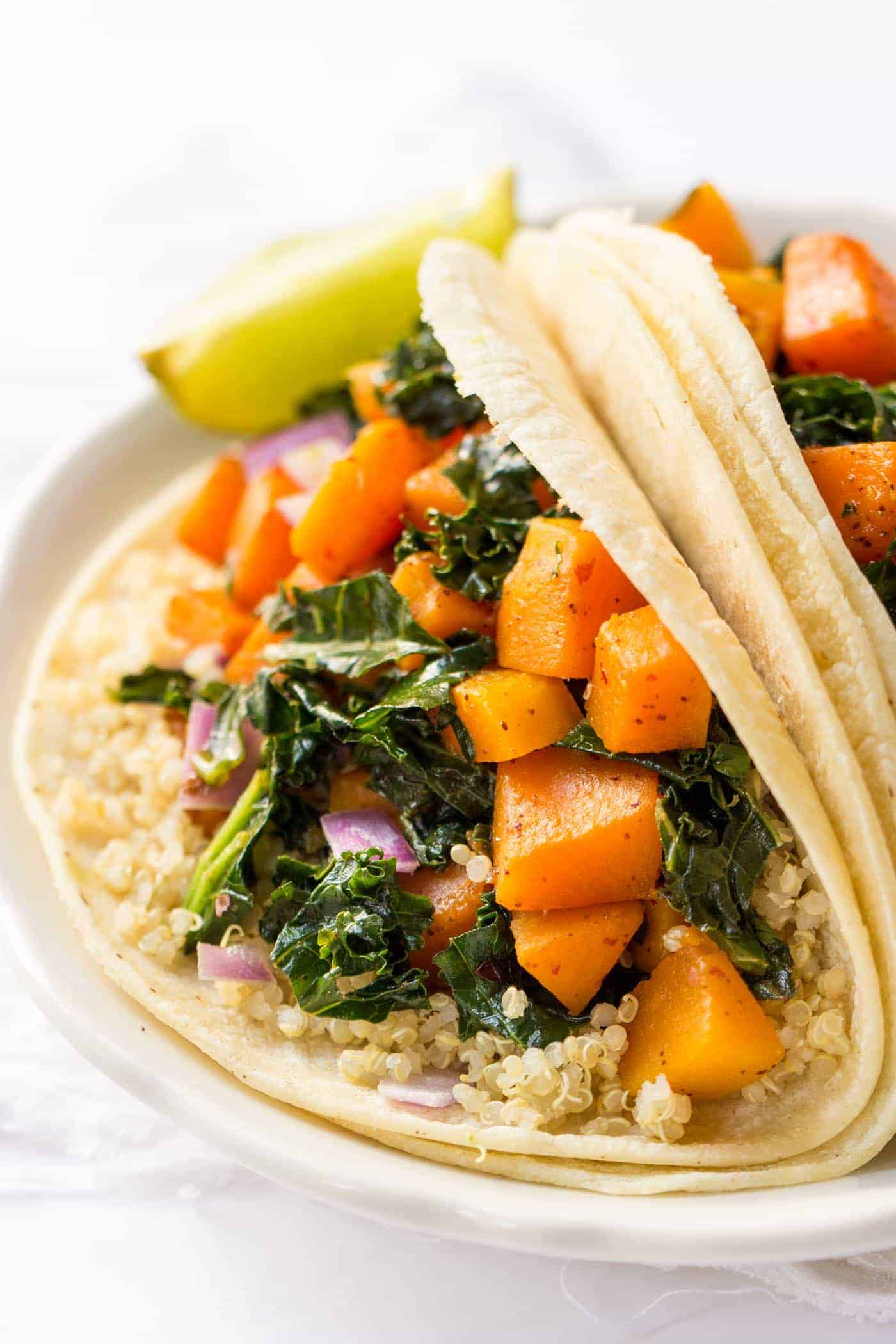 These VEGAN quinoa breakfast tacos are the perfect way to start the day -- protein-packed, fiber-rich and loads of veggies!