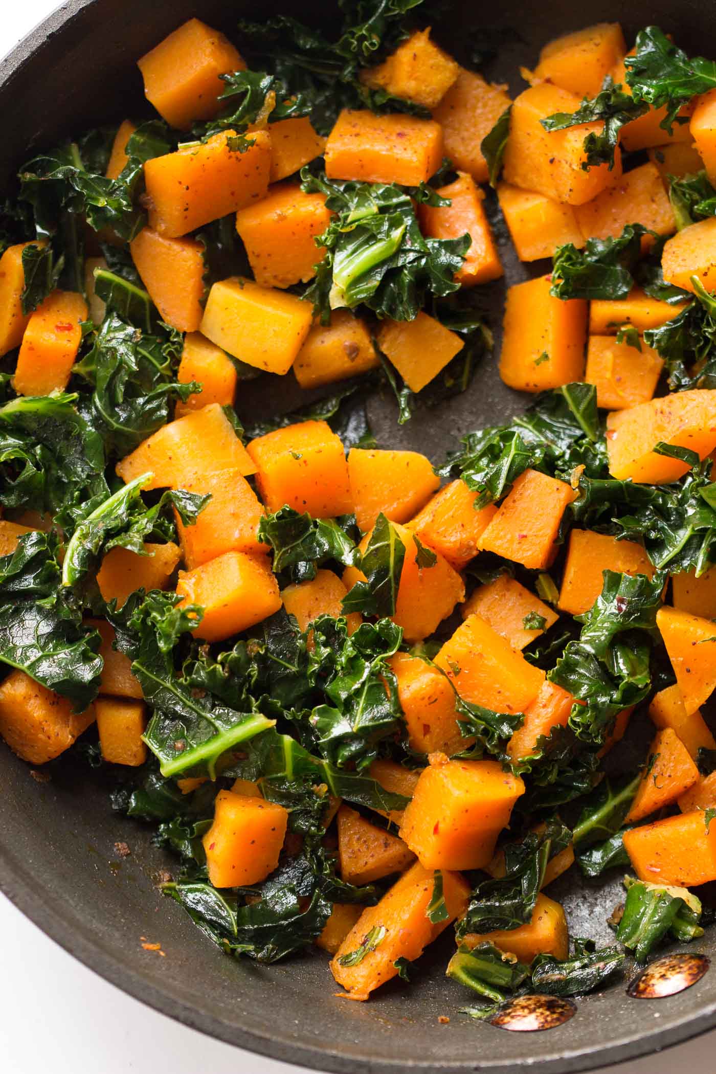 A simply butternut + kale skillet makes the PERFECT filling for breakfast tacos!