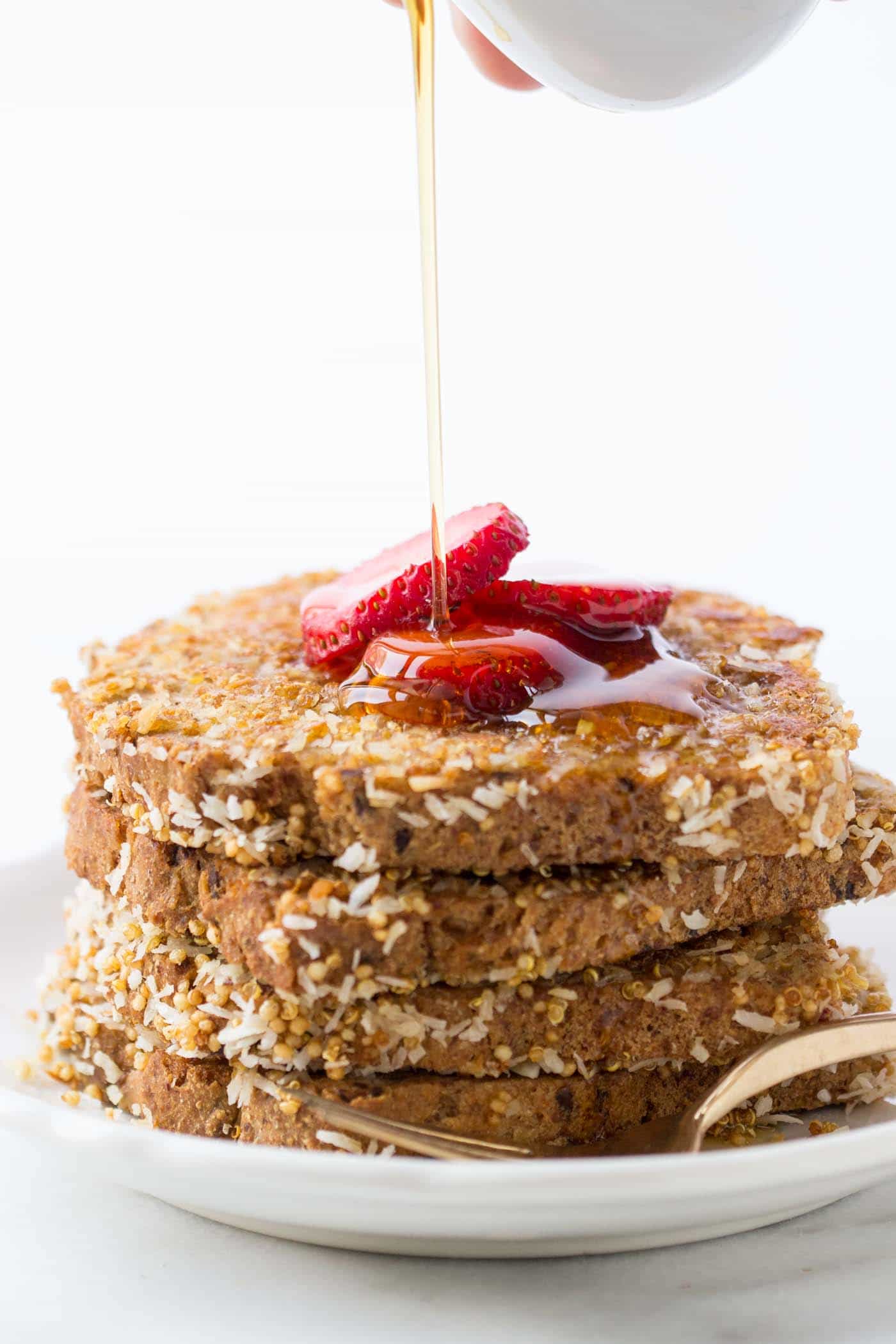 Coconut + Quinoa Crusted Vegan French Toast -- an absolutely EPIC breakfast that requires just 7 HEALTHY ingredients!