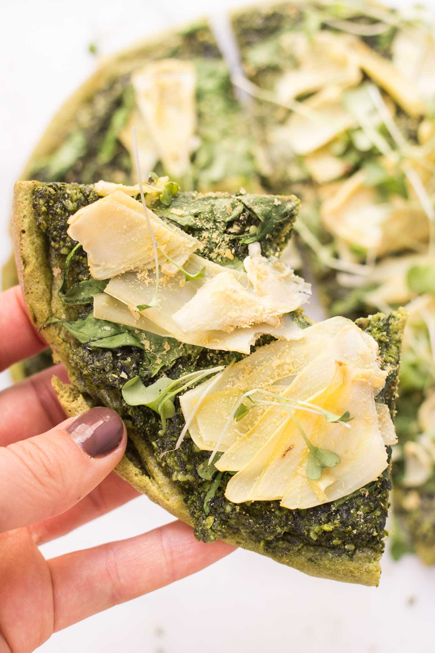 Need a HEALTHY pizza crust recipe? You've got to try this QUINOA PIZZA! It's made with only a few simple ingredients and can be topped with anything!