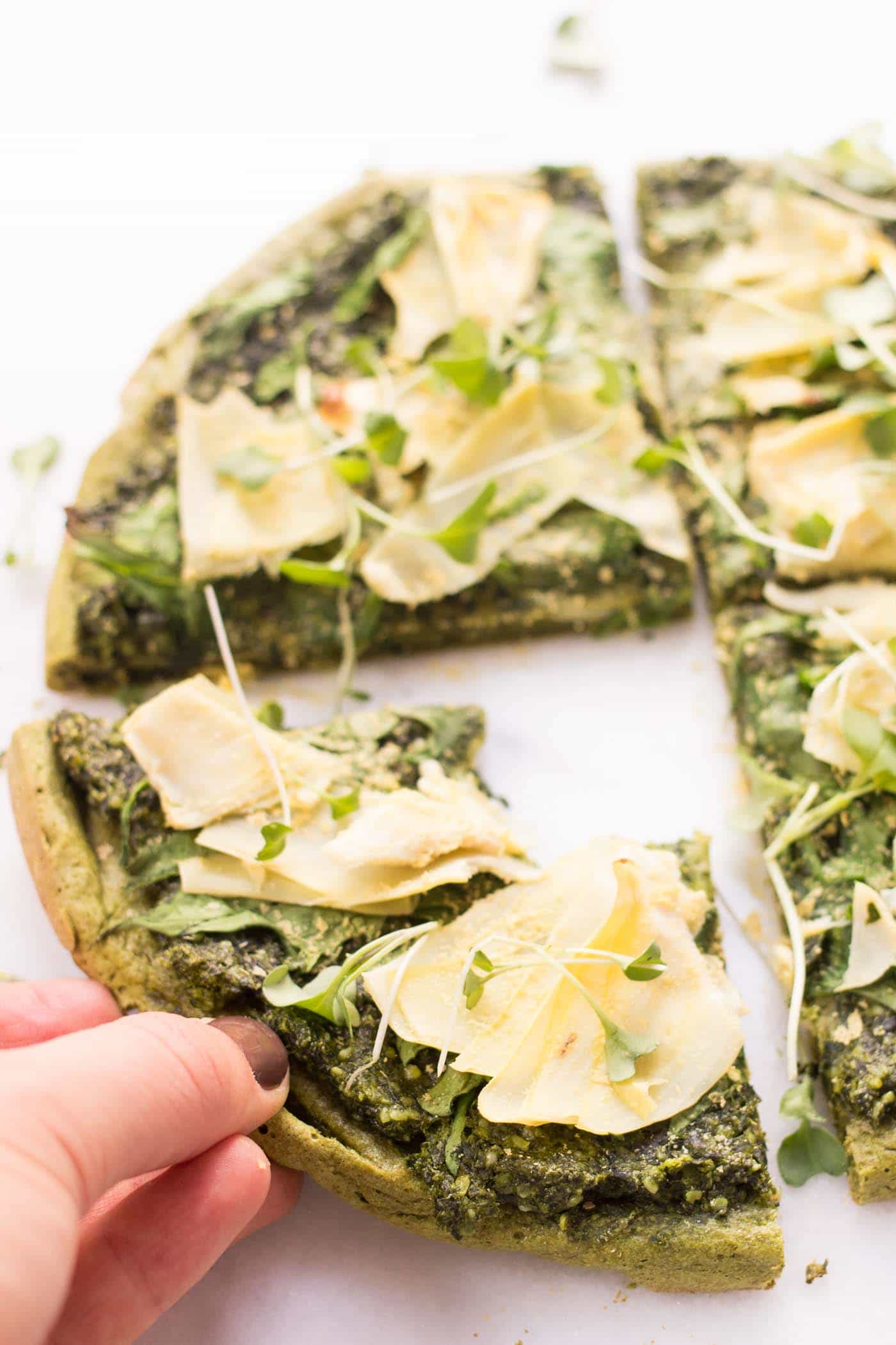 I can't believe this pizza is made from QUINOA! It's so easy, vegetarian + vegan-friendly, gluten-free AND it's topped with all my favorite ingredients!