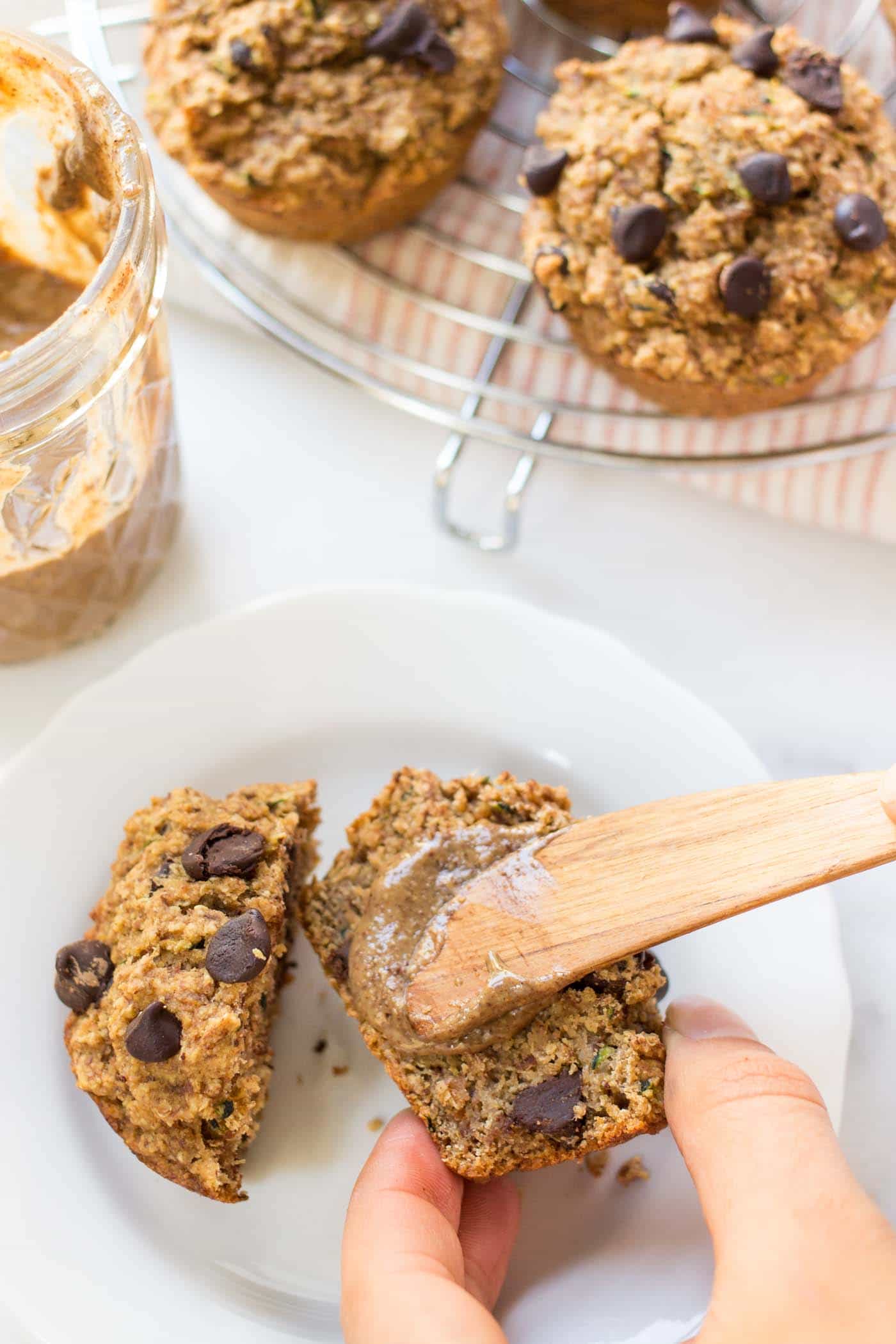 Vegan Chocolate Chip Zucchini Muffins -- perfectly tender and so delicious when slathered with your favorite nut butter!