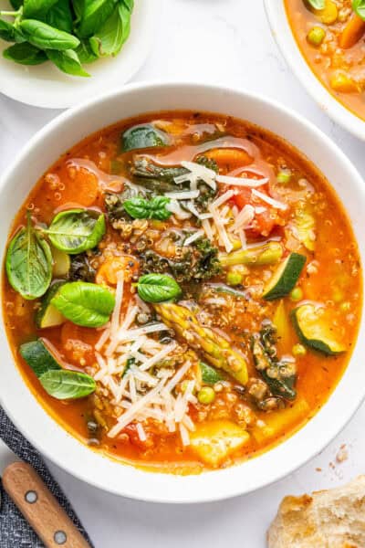Top down view of vegetarian minestrone soup in bowl