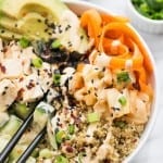 Quinoa Sushi Bowls! Made with tons of veggies, spicy tofu and a ginger miso dressing!