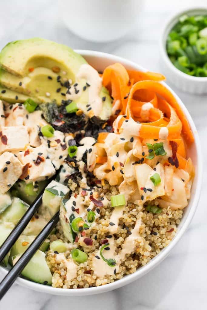 Quinoa Sushi Bowls! Made with tons of veggies, spicy tofu and a ginger miso dressing!