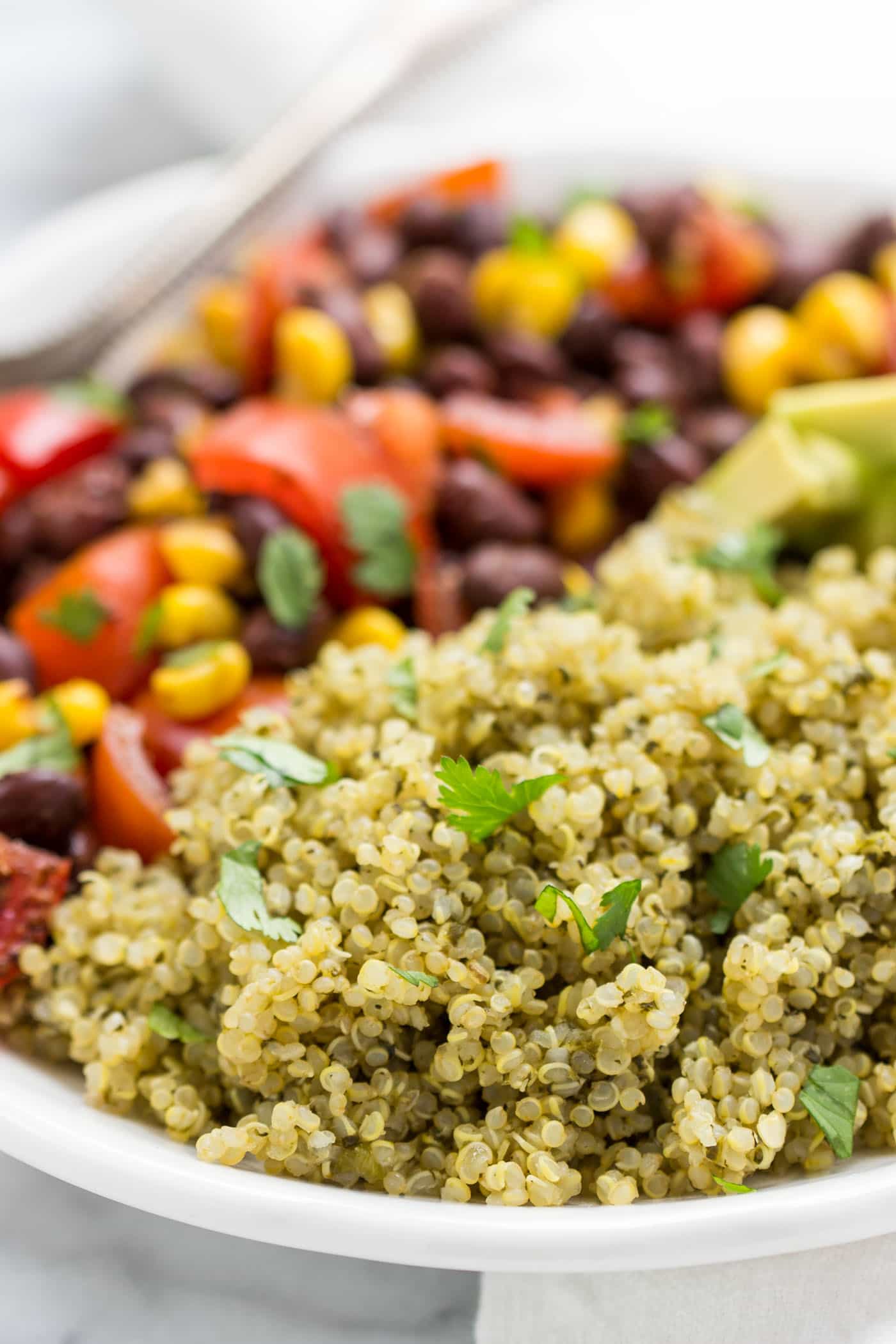 Spicy Green Mexican Quinoa -- cooked with spinach, cilantro, jalapeno, garlic and lime!