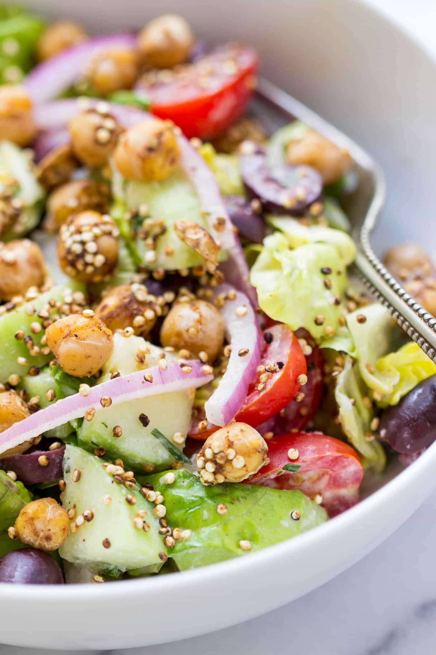 My favorite salad for the summer -- vegan chopped salad with a tarragon tahini dressing AND warm chickpeas!