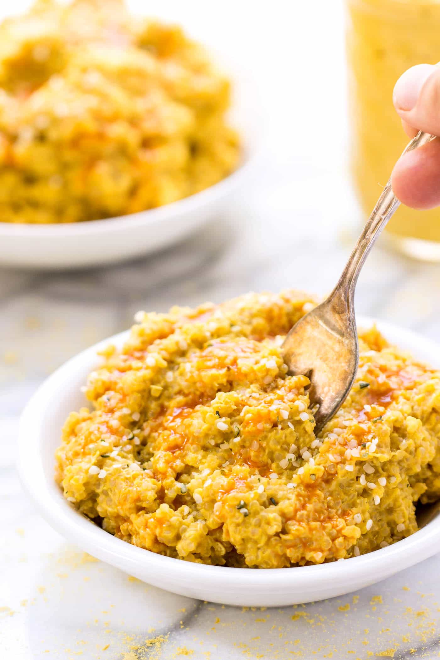 This is the BEST quinoa mac and cheese out there...with a creamy cauliflower buffalo sauce! {vegan + gluten-free}