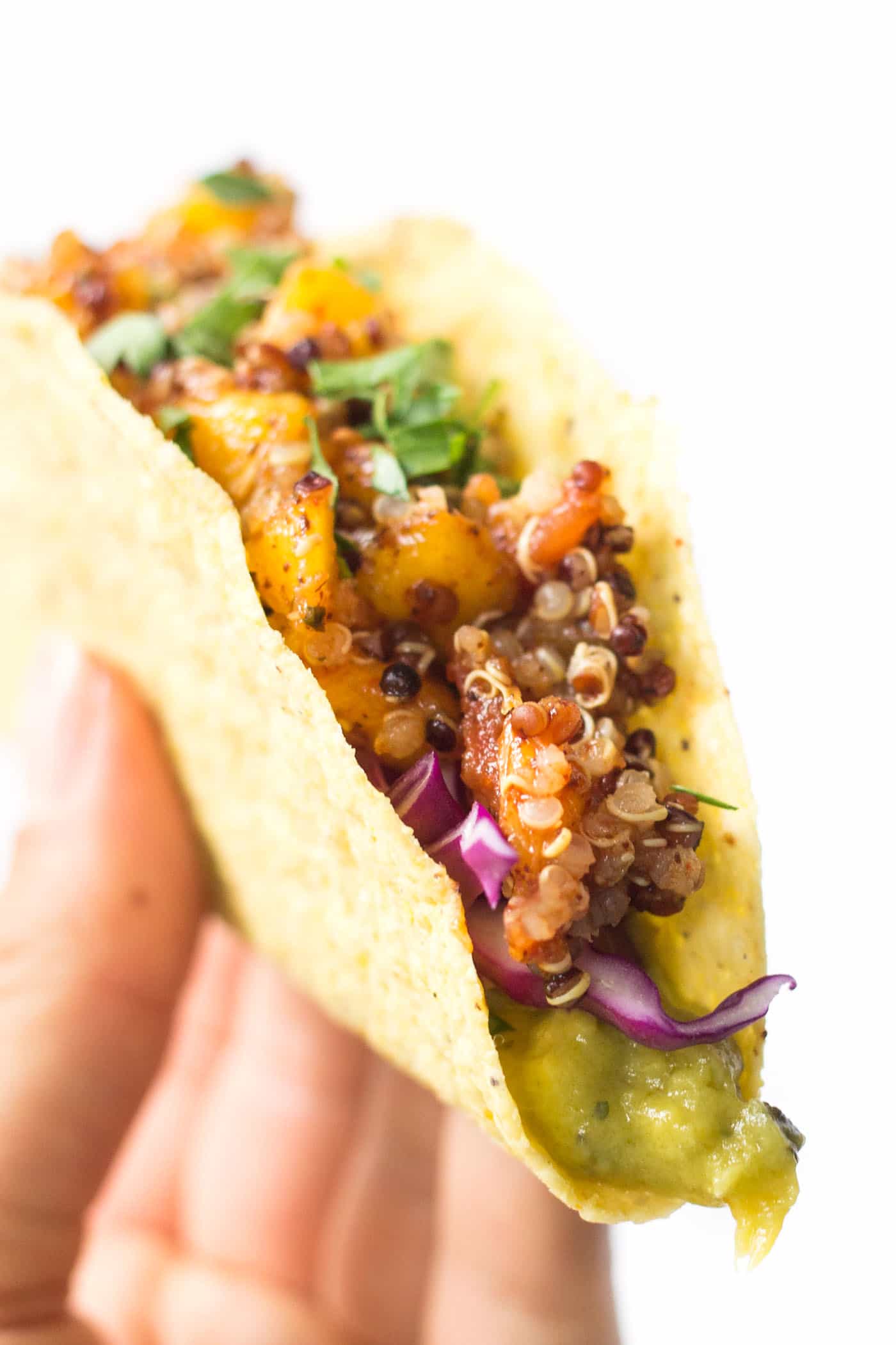 These super easy QUINOA TACOS are meatless, healthy and flavored with a spicy mango-lime filling!