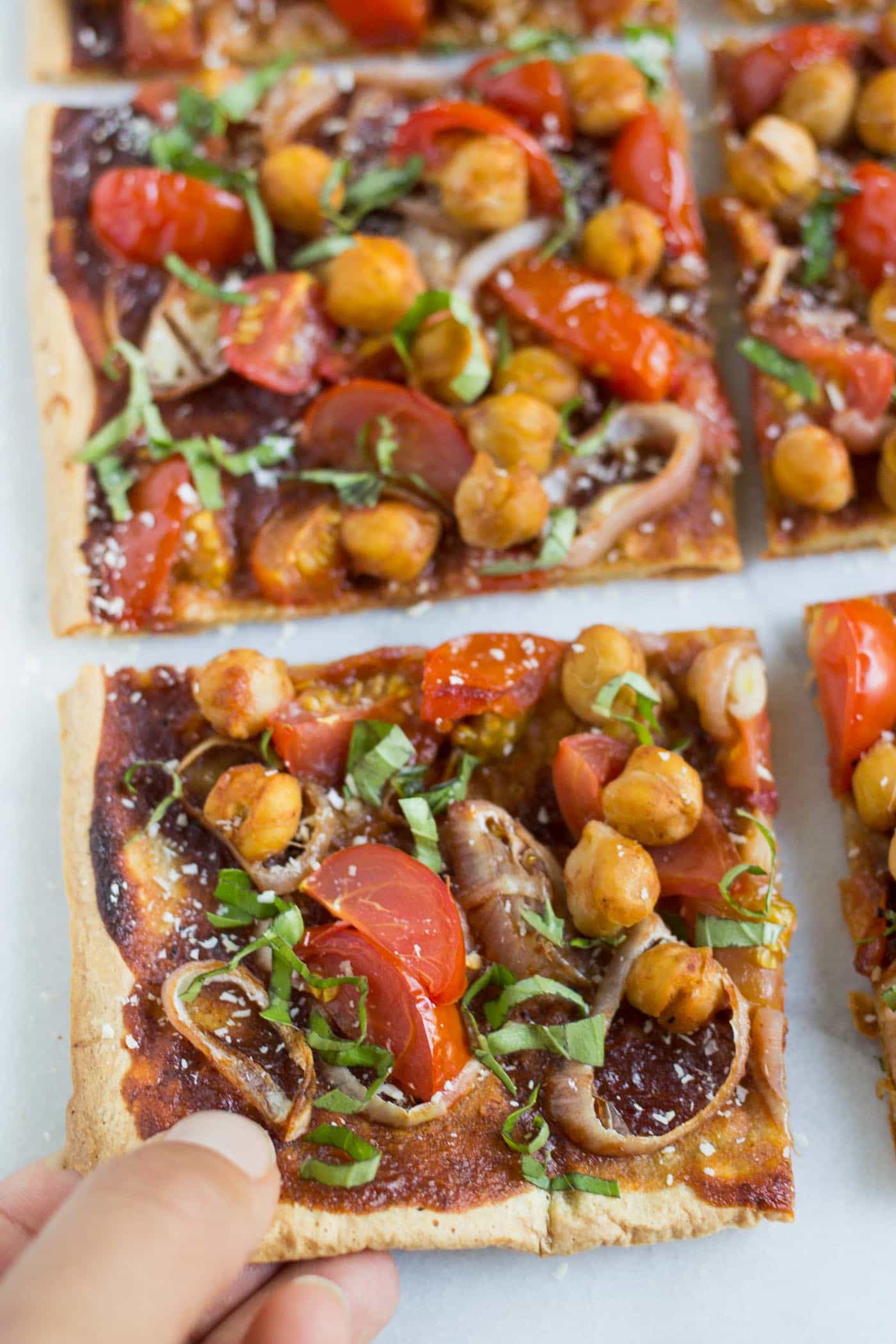 QUINOA PIZZA!! a thin and crispy crust that is make with just quinoa! holds up to all kinds of toppings too!