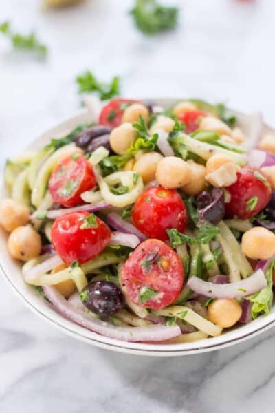 Cucumber Noodle Greek Salad -- a light and refreshing pasta salad that is healthy and satisfying!