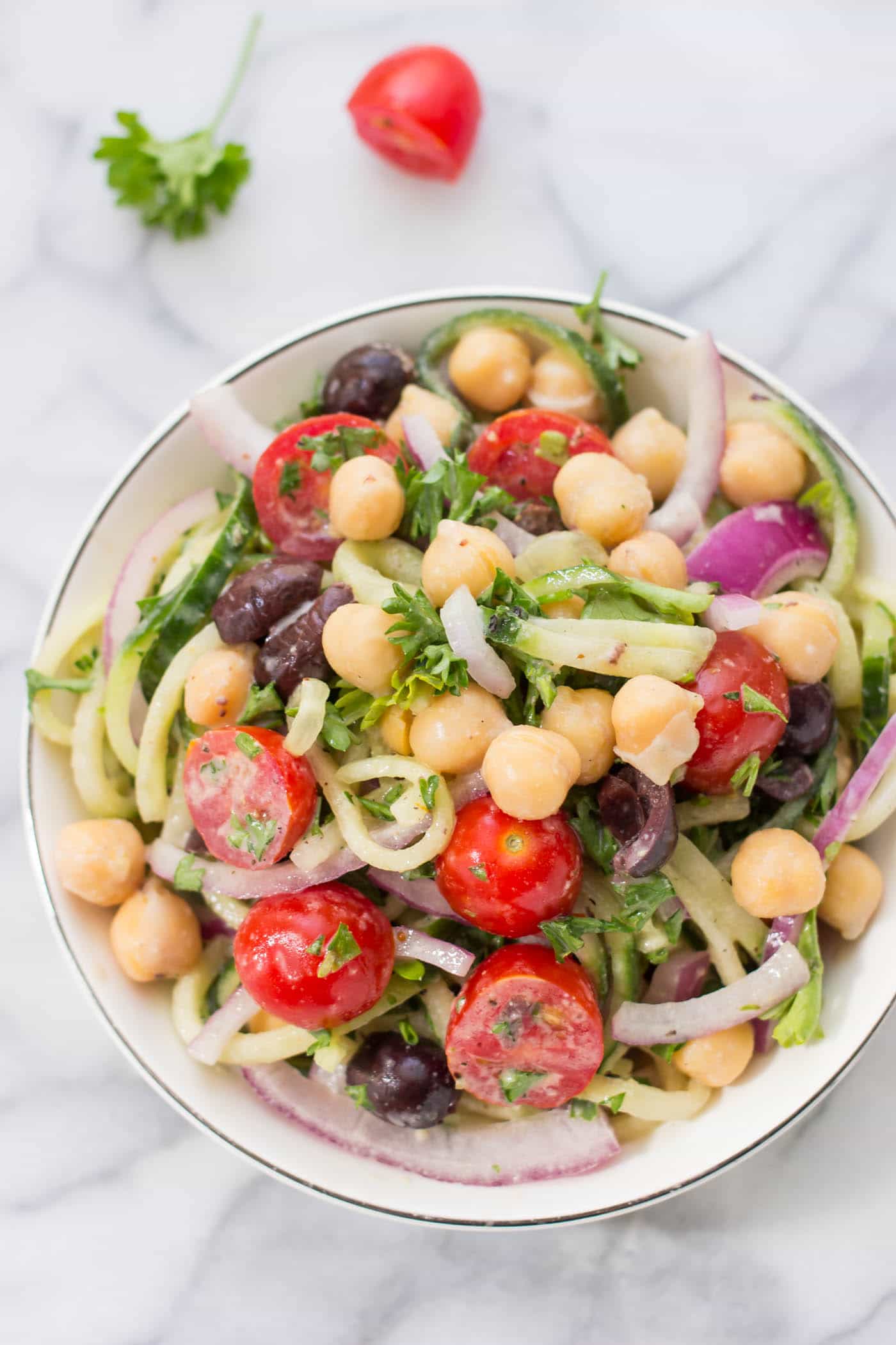 Cucumber Noodle Greek Salad -- a light and refreshing pasta salad that is healthy and satisfying!