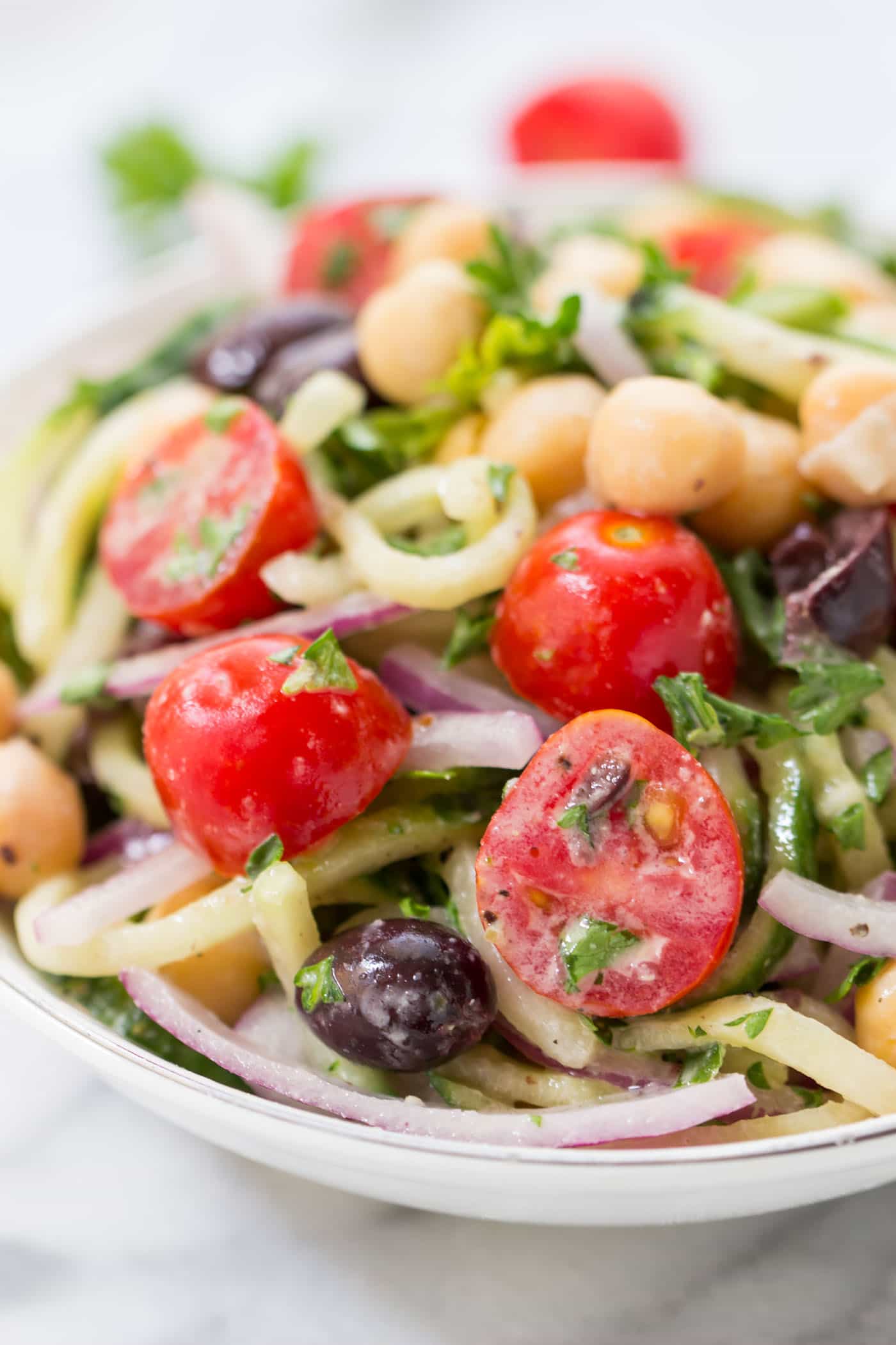 CUCUMBER NOODLE GREEK SALAD -- a refreshing twist on a traditional salad! [vegan + dairy-free]