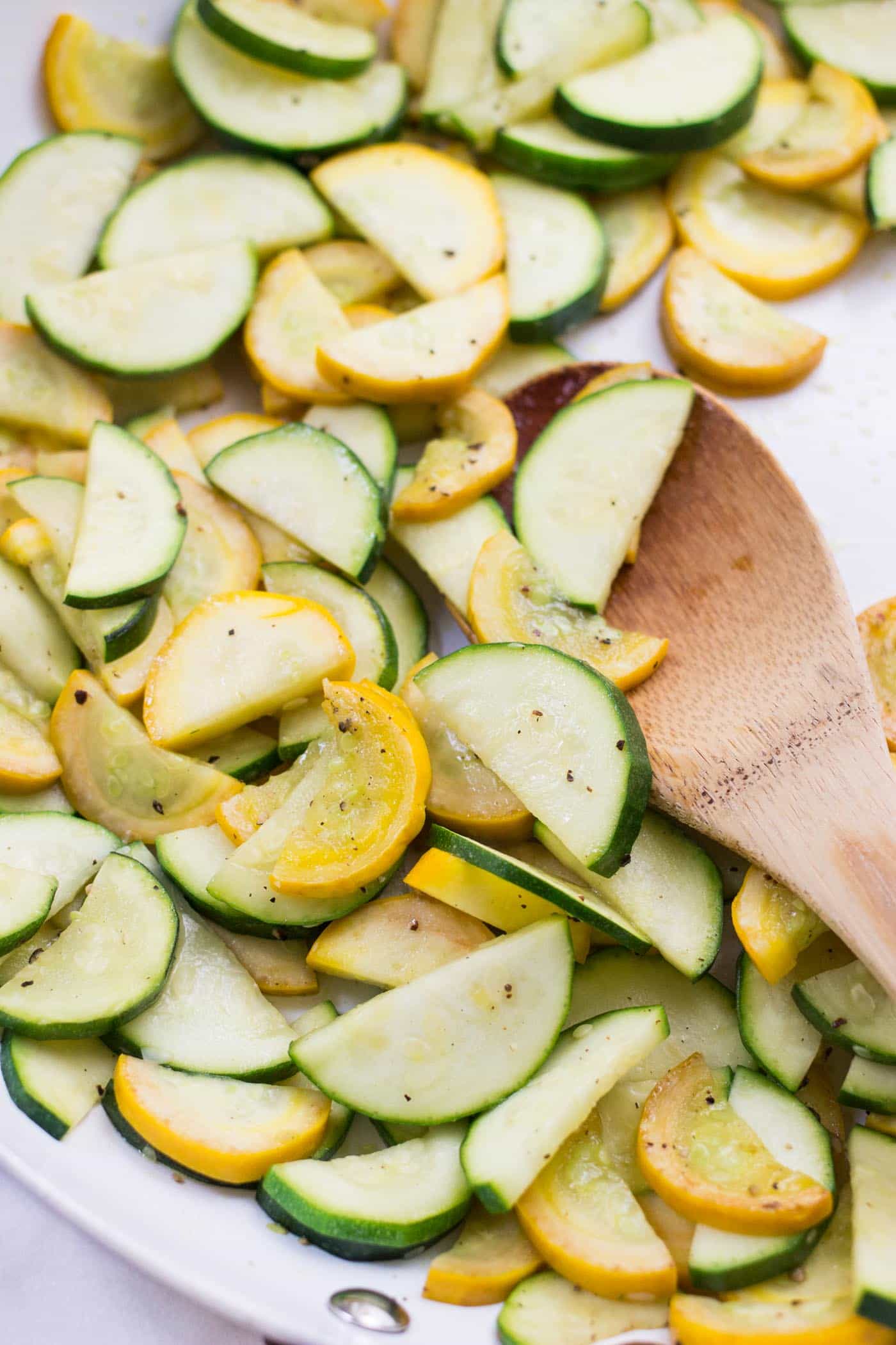 Summer Zucchini Quinoa Salad with warm sauteed vegetables, toasted pine nuts and a dreamy lemon-dill dressing!