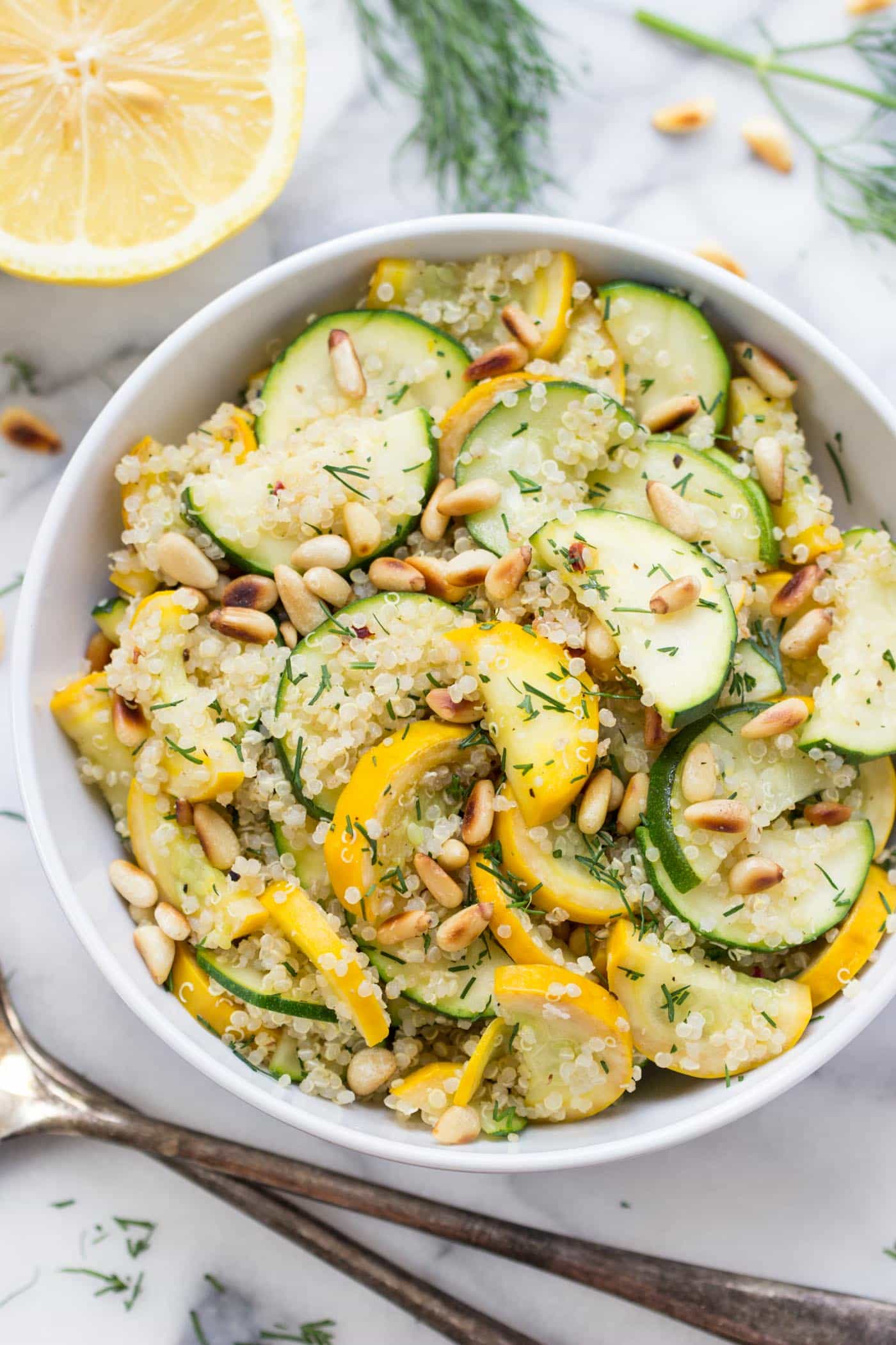 Summer Zucchini Quinoa Salad with warm sauteed vegetables, toasted pine nuts and a dreamy lemon-dill dressing!