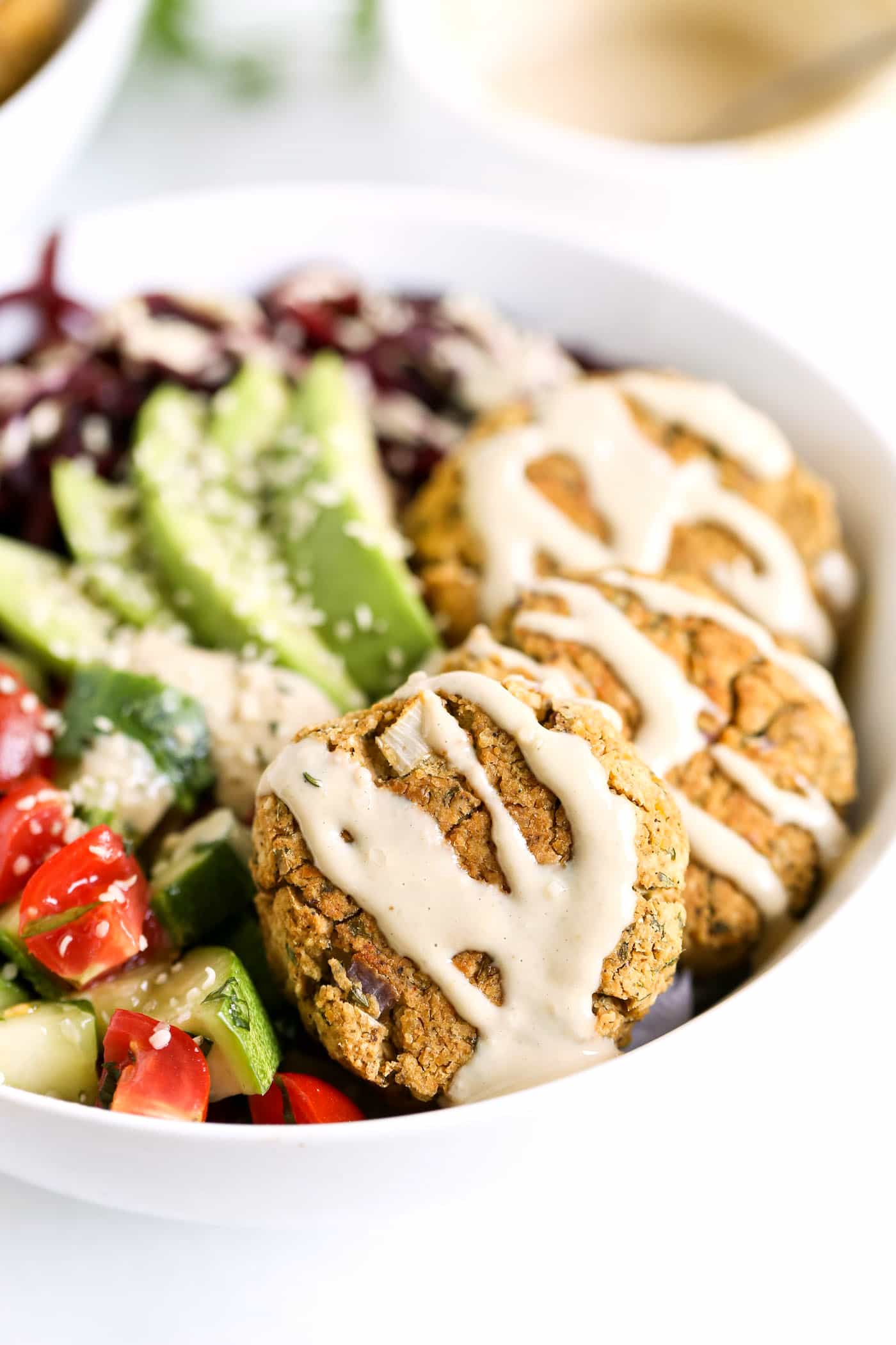 EASY BAKED FALAFEL BOWLS with roasted beet noodles and a creamy tahini dressing [VEGAN]