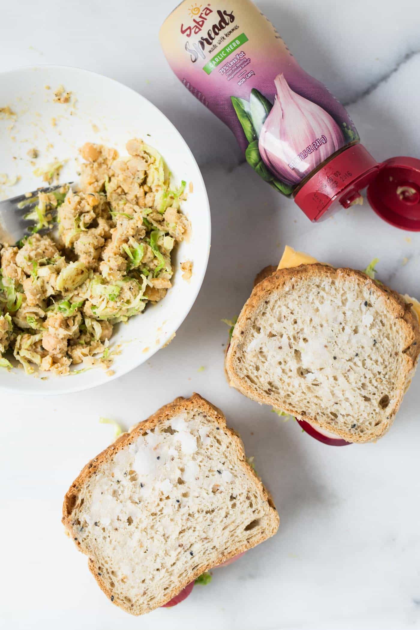 A simple vegan grilled cheese sandwich with brussels sprouts and hummus!