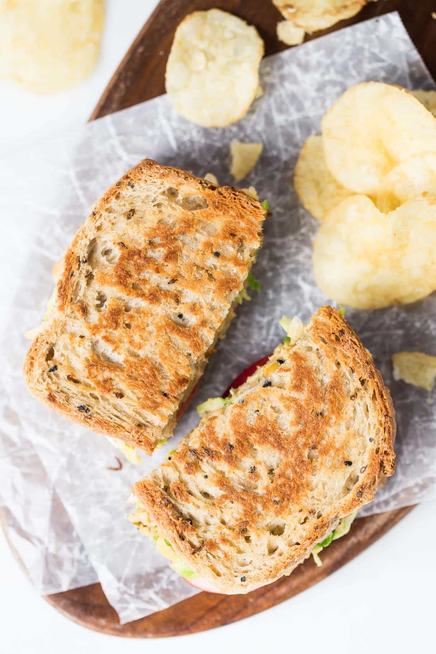 The perfect VEGAN Grilled Cheese -- with brussels sprouts + hummus for a plant-powered and protein-packed lunch!