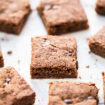 Ooey-gooey Pumpkin Spice Quinoa Blondies with dark chocolate chips! They're the perfect fall dessert!