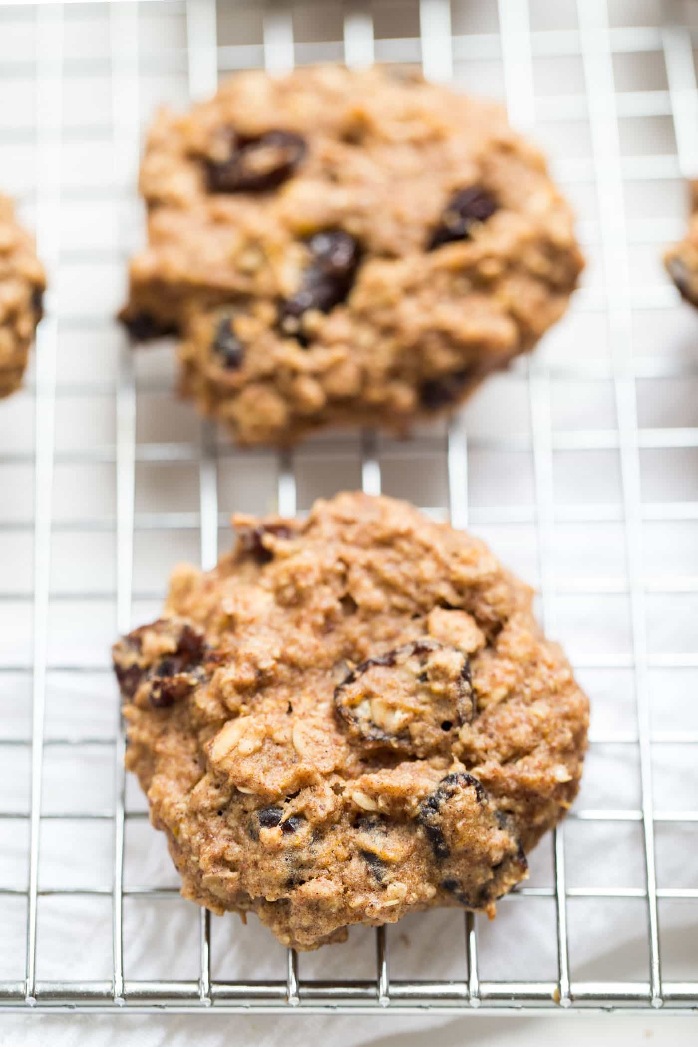 These Cranberry Orange Quinoa Breakfast Cookies double as a healthy breakfast or a decadent dessert! They'd be perfect for a holiday cookie swap!