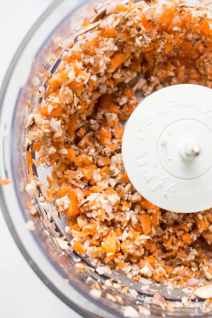 Finely minced carrots, shallots, and mushrooms in a food processor.