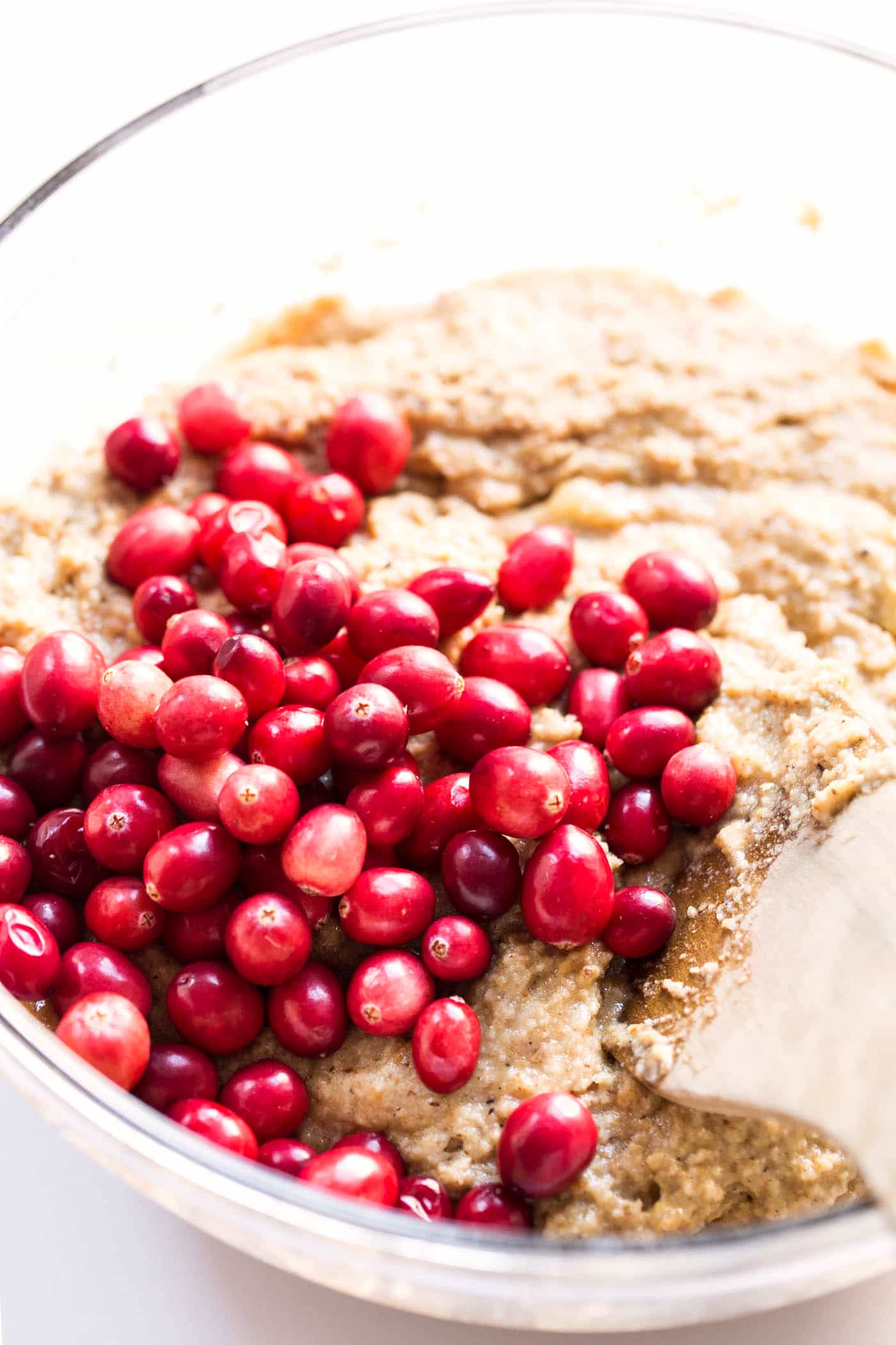 This Cranberry Quinoa Banana Bread is super HEALTHY -- made with quinoa flour, almond flour, banana and sweetened with honey and fresh cranberries!