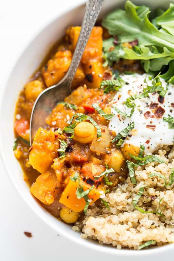This slow cooker Moroccan Chickpea Stew is made with tons of aromatic spices, butternut squash and red lentils for a hearty, plant-based dinner!