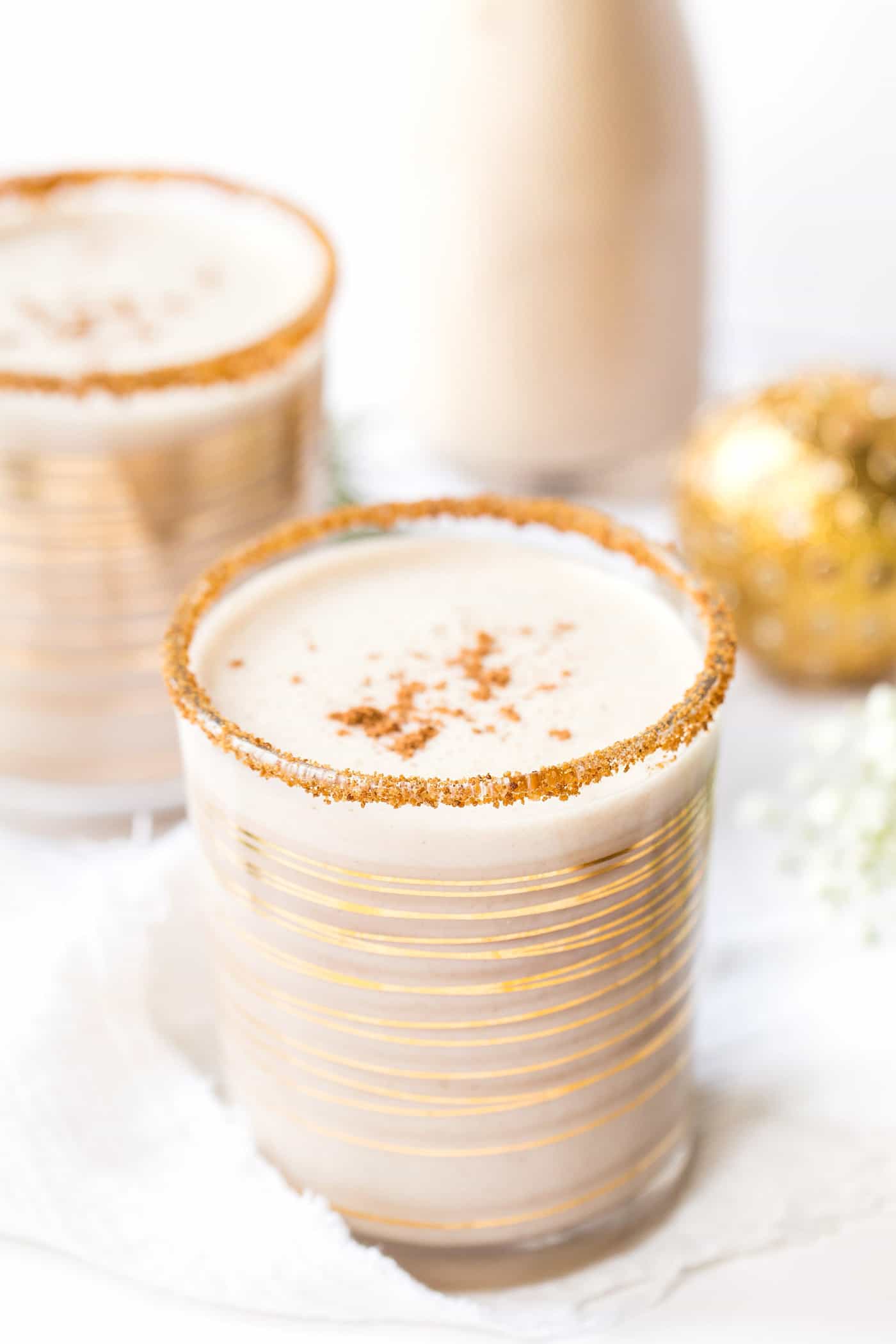 This AMAZING Vegan Eggnog is made with a blend of raw cashews and coconut milk to make it ultra creamy and totally delicious!