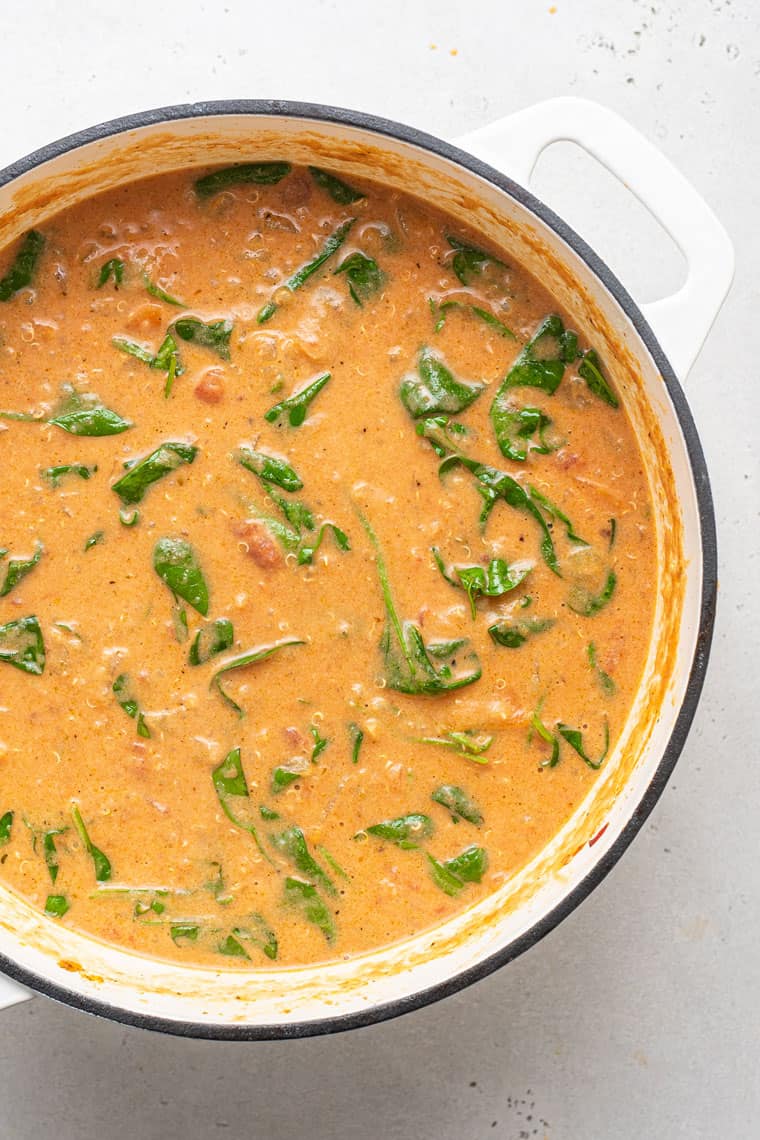 pot of creamy italian soup with spinach