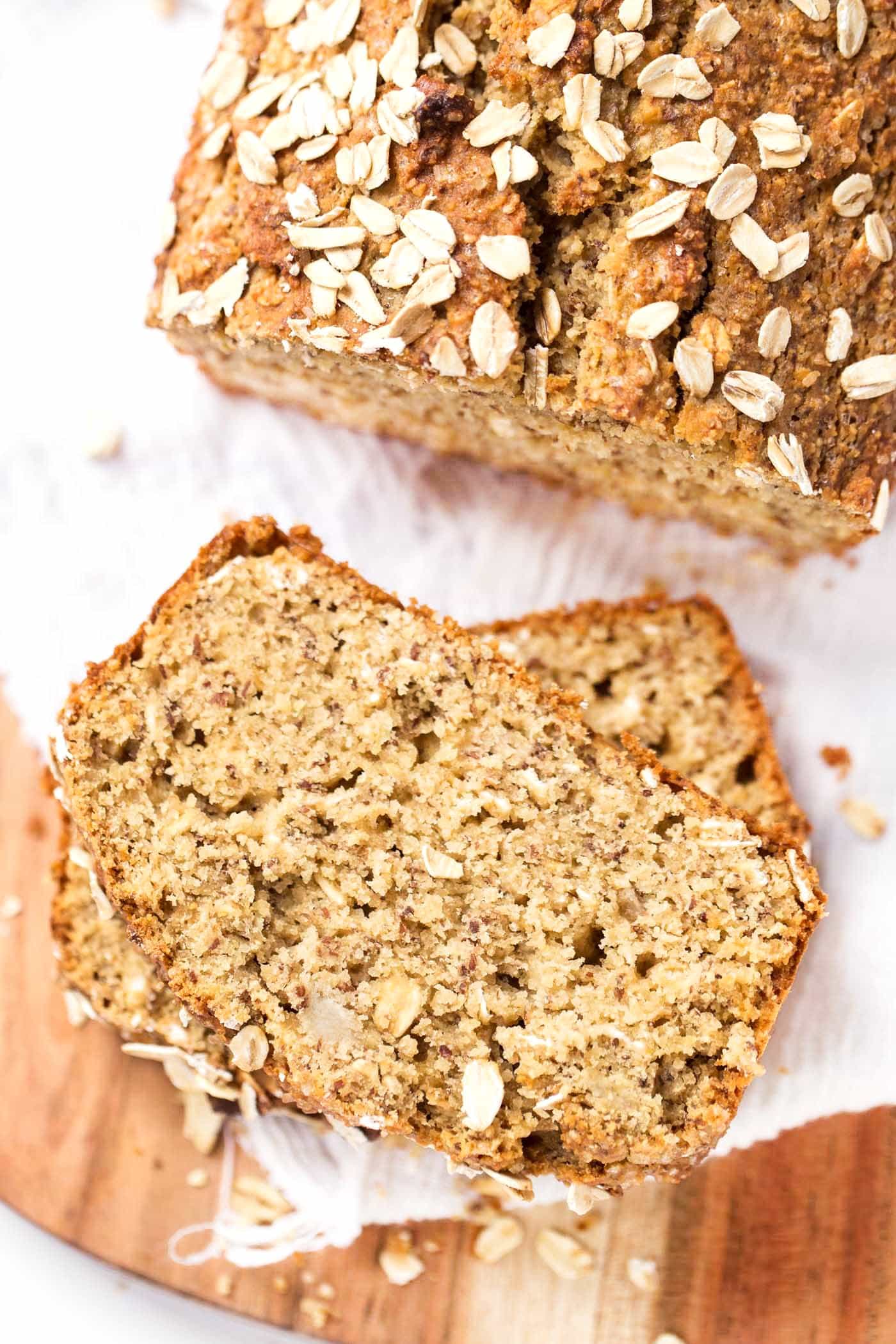 This HEALTHY Honey Oatmeal Banana Bread is packed with nutrient-dense flours, sweetened naturally and uses just one tablespoon of oil!