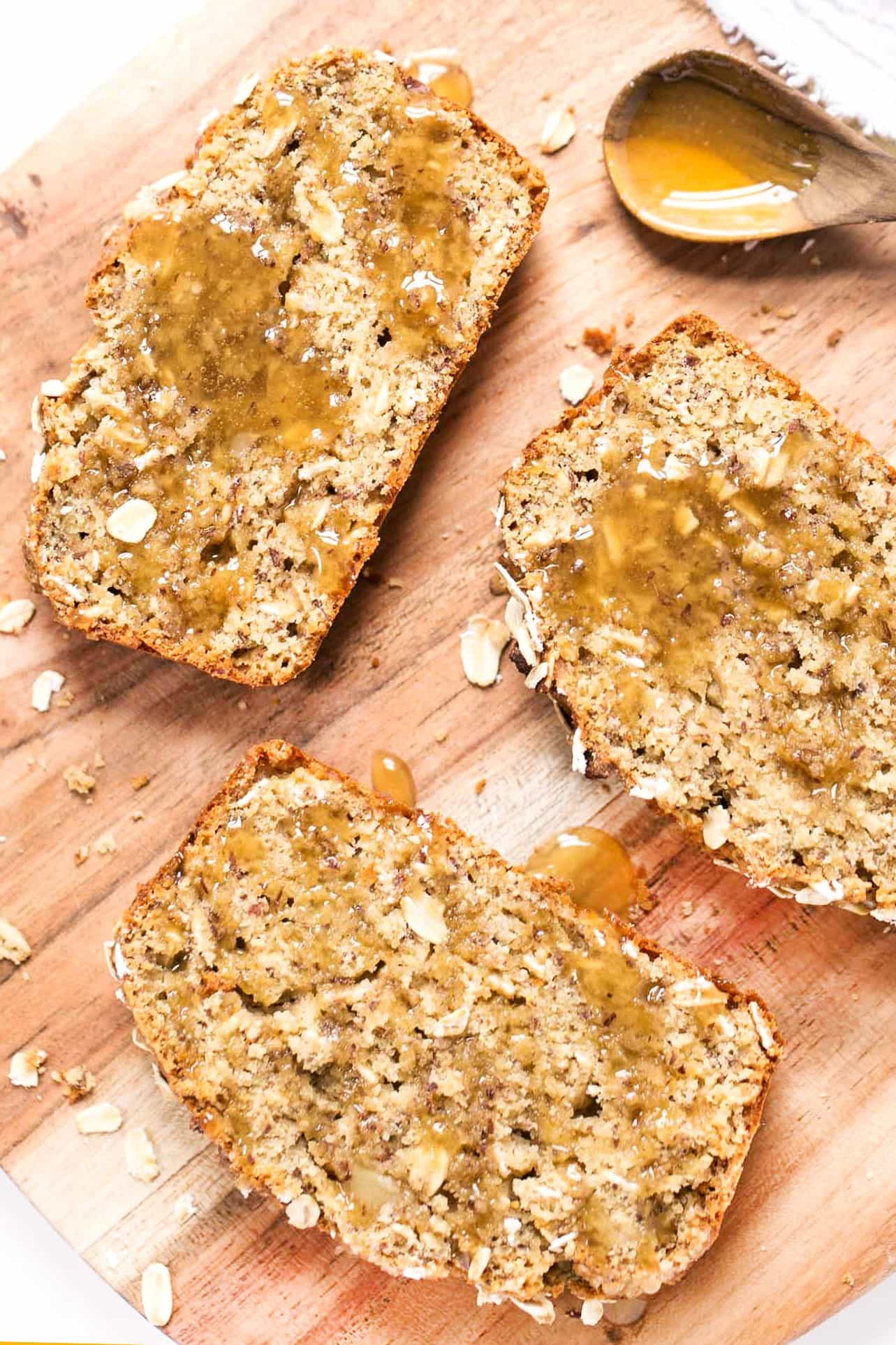 This HEALTHY Honey Oatmeal Banana Bread is packed with nutrient-dense flours, sweetened naturally and uses just one tablespoon of oil!