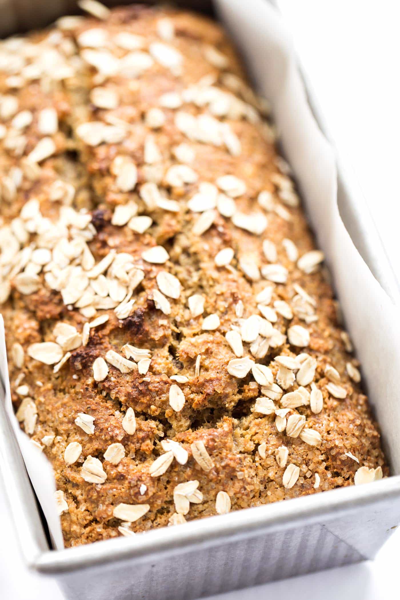 This HEALTHY Honey Oatmeal Banana Bread is packed with nutrient-dense flours, sweetened naturally and uses just one tablespoon of oil!