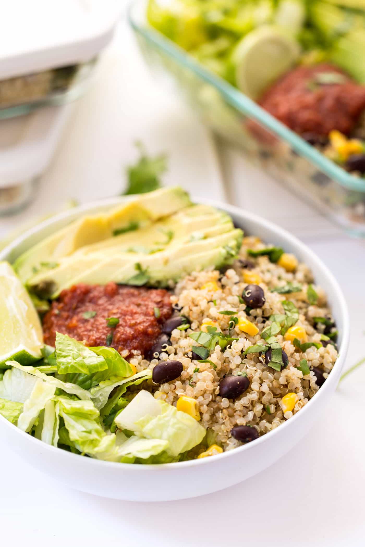Vegetarian Quinoa Burrito Bowls -- perfect for meal prep and ready in under 20 minutes!