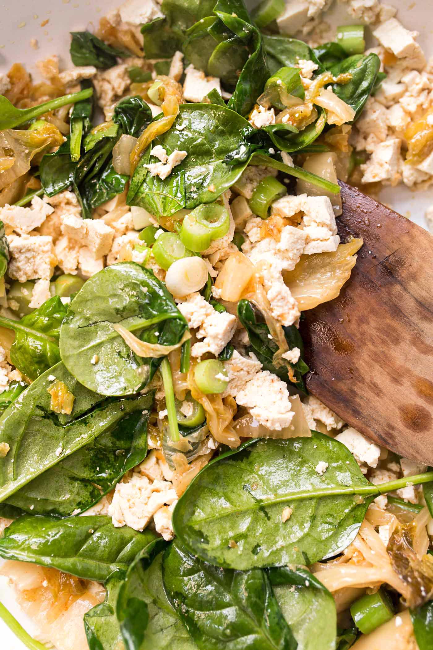 5-Ingredient Tofu Scramble in the making! With kimchi, spinach and green onions for crunch!