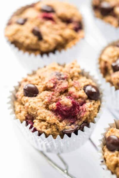 These SKINNY Raspberry Chocolate Chip Quinoa Muffins are made in just one bowl, packed with healthy ingredients and don't use any oil, eggs or dairy!