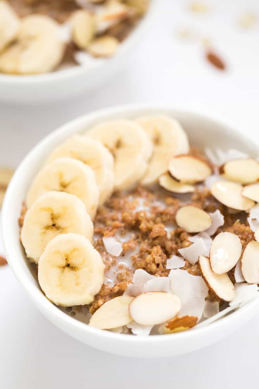 Quinoa Power Breakfast Bowls -- topped with almonds, coconut and bananas!