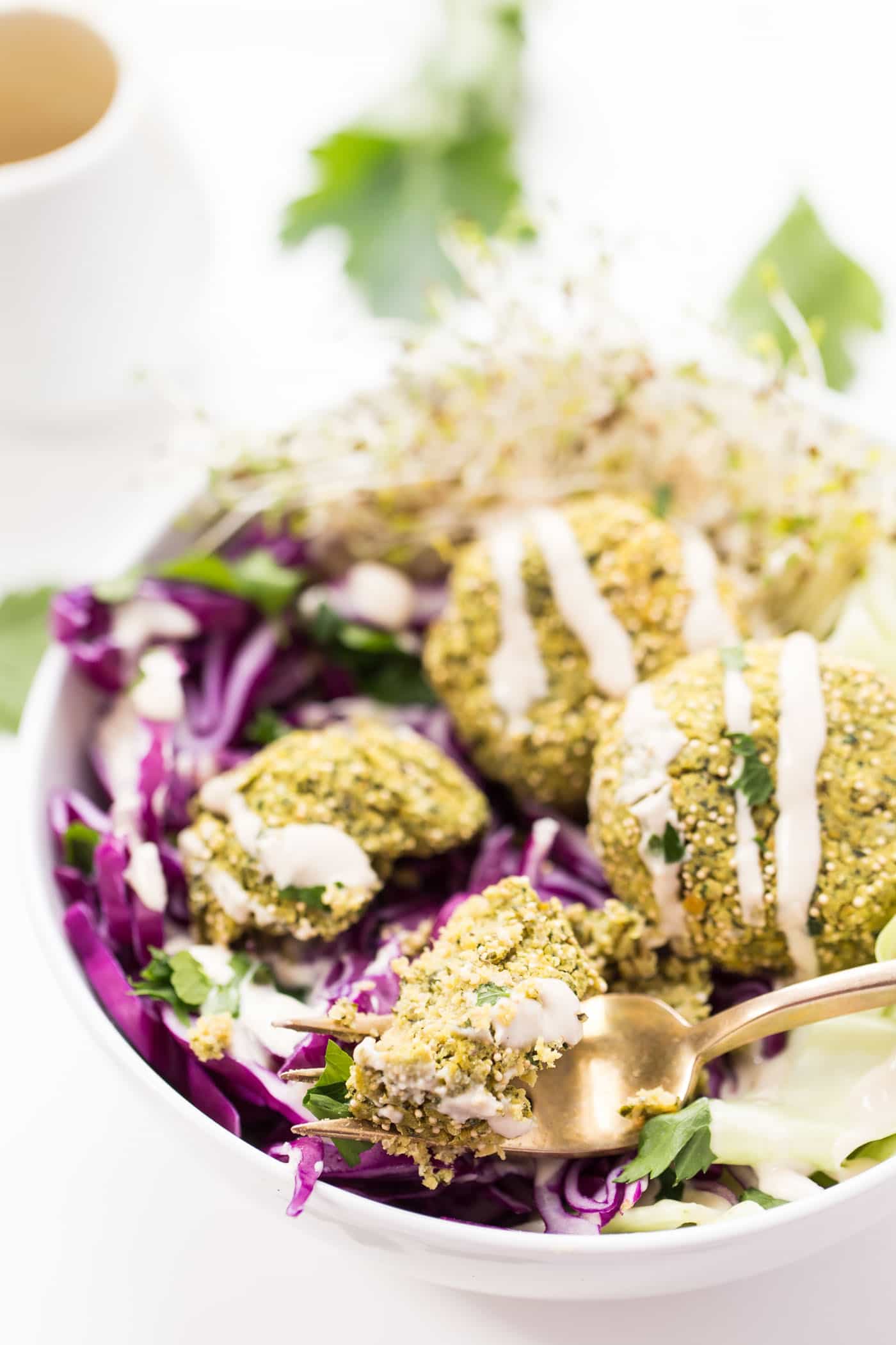 Baked instead of fried, this healthy vegan baked falafel combines protein-rich chickpeas with crunchy amaranth for a nutritious and delicious sandwich filling or topping to your salad!