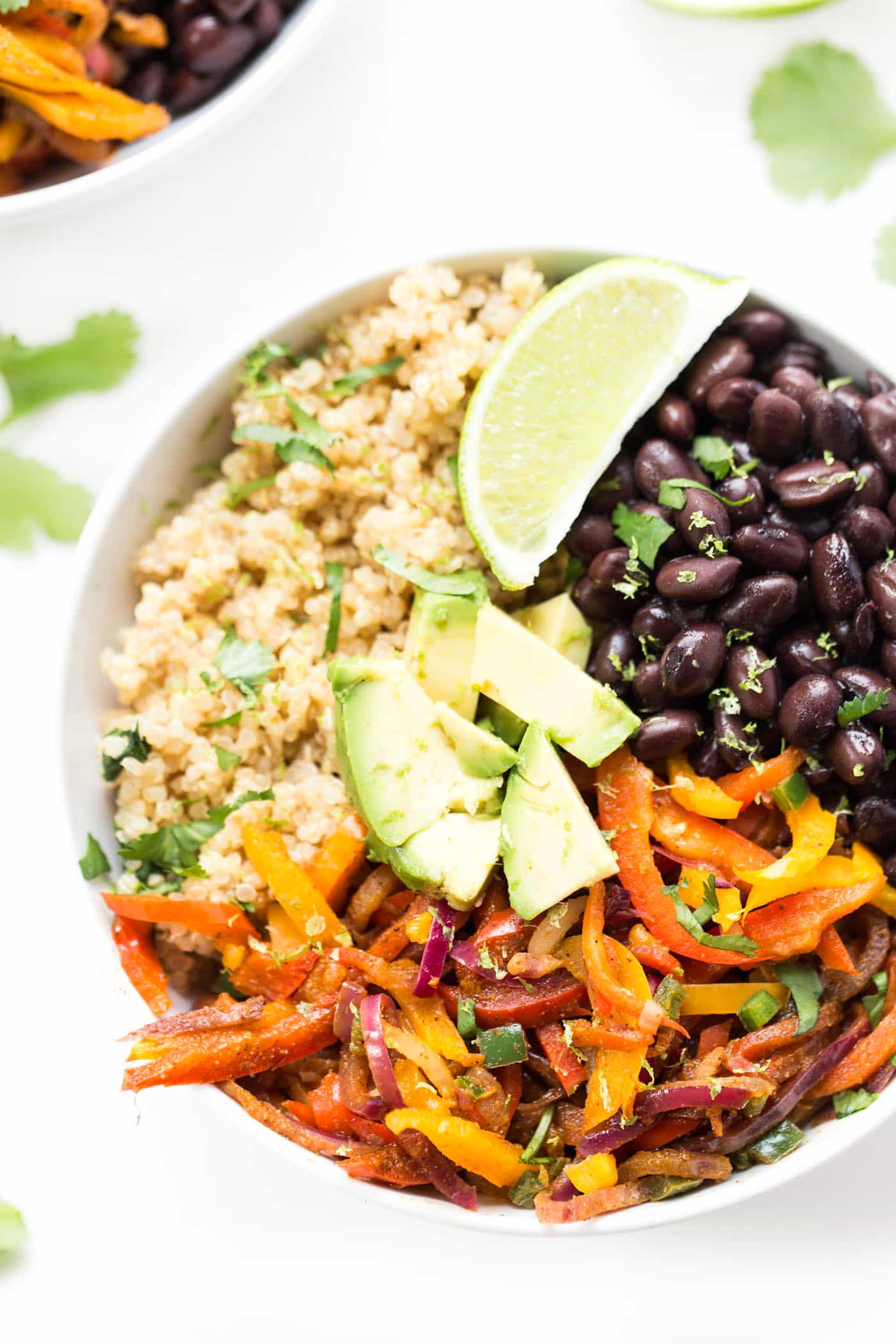 Black Bean Quinoa Fajita Bowls -- ready in just 20 minutes, this meatless meal is packed with protein, veggies and healthy carbs!