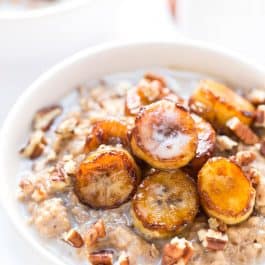 CREAMY STEEL CUT OATS topped with caramelized bananas, pecans and a drizzle of almond milk! [VEGAN]