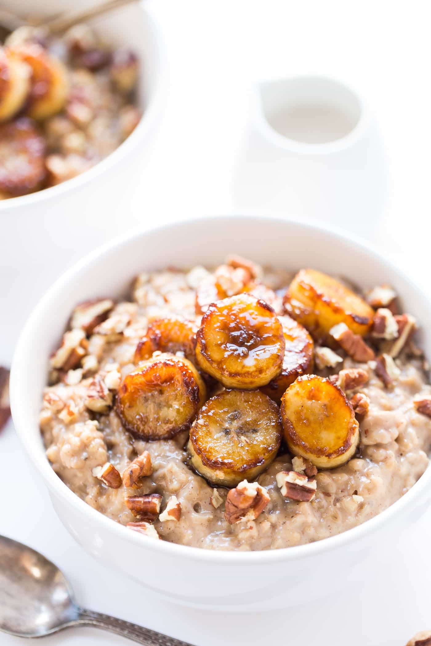 Learn how to make the CREAMIEST steel cut oats on the planet! With an even more delicious Caramelized Bananas on top!
