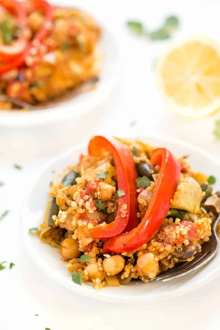 This easy Vegetarian Quinoa Paella is made in just ONE PAN, packed with flavor and is ready in less than 40 minutes!