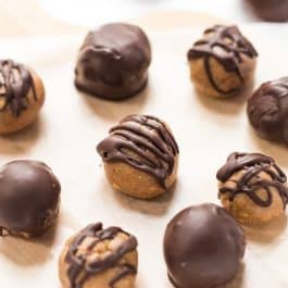ALMOND BUTTER TRUFFLES made with just 4 ingredients: almond butter, maple syrup, coconut flour and chocolate!